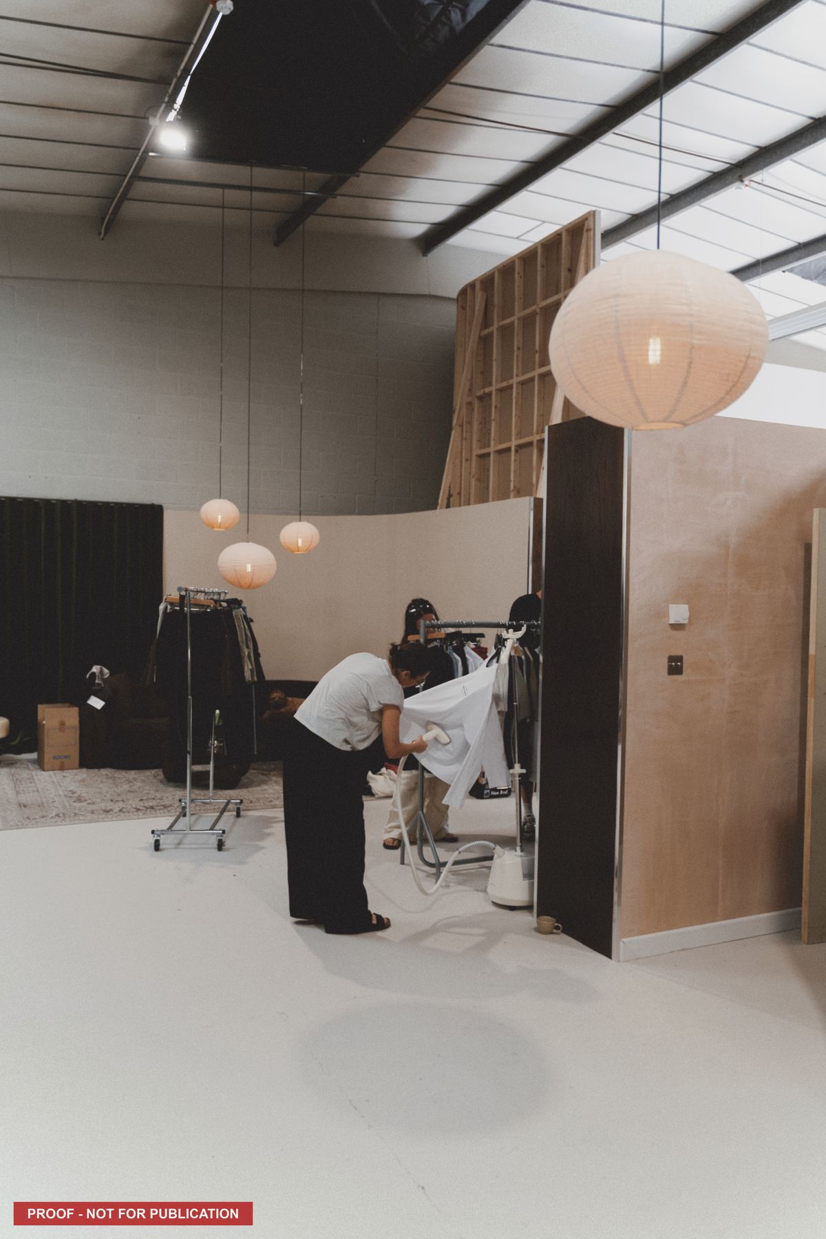 Rails and styling laid out across the studio floor.